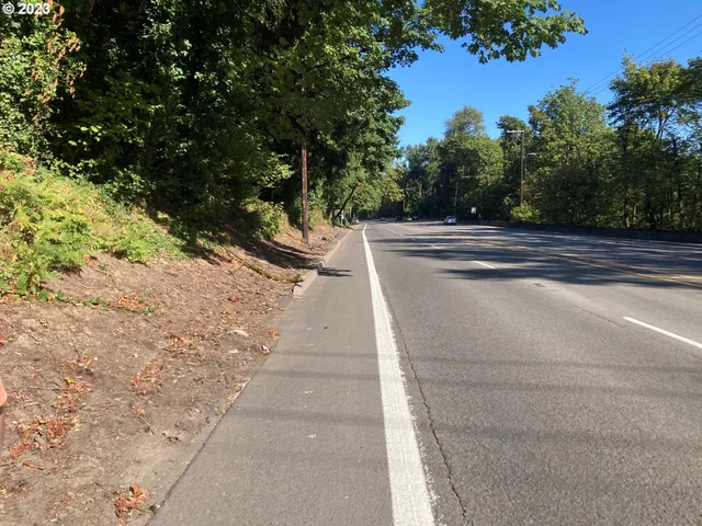 a view of balcony with yard