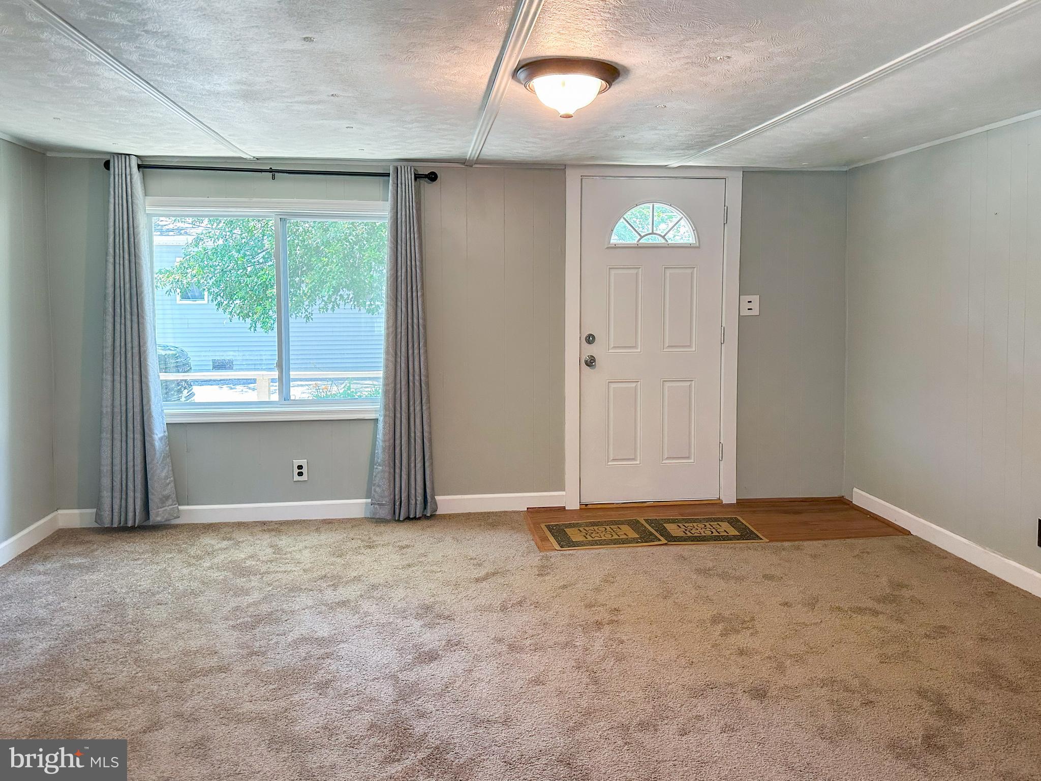 31743 Siham Road Lewes, DE 19958 - Photo 4 of 12 an empty room with window