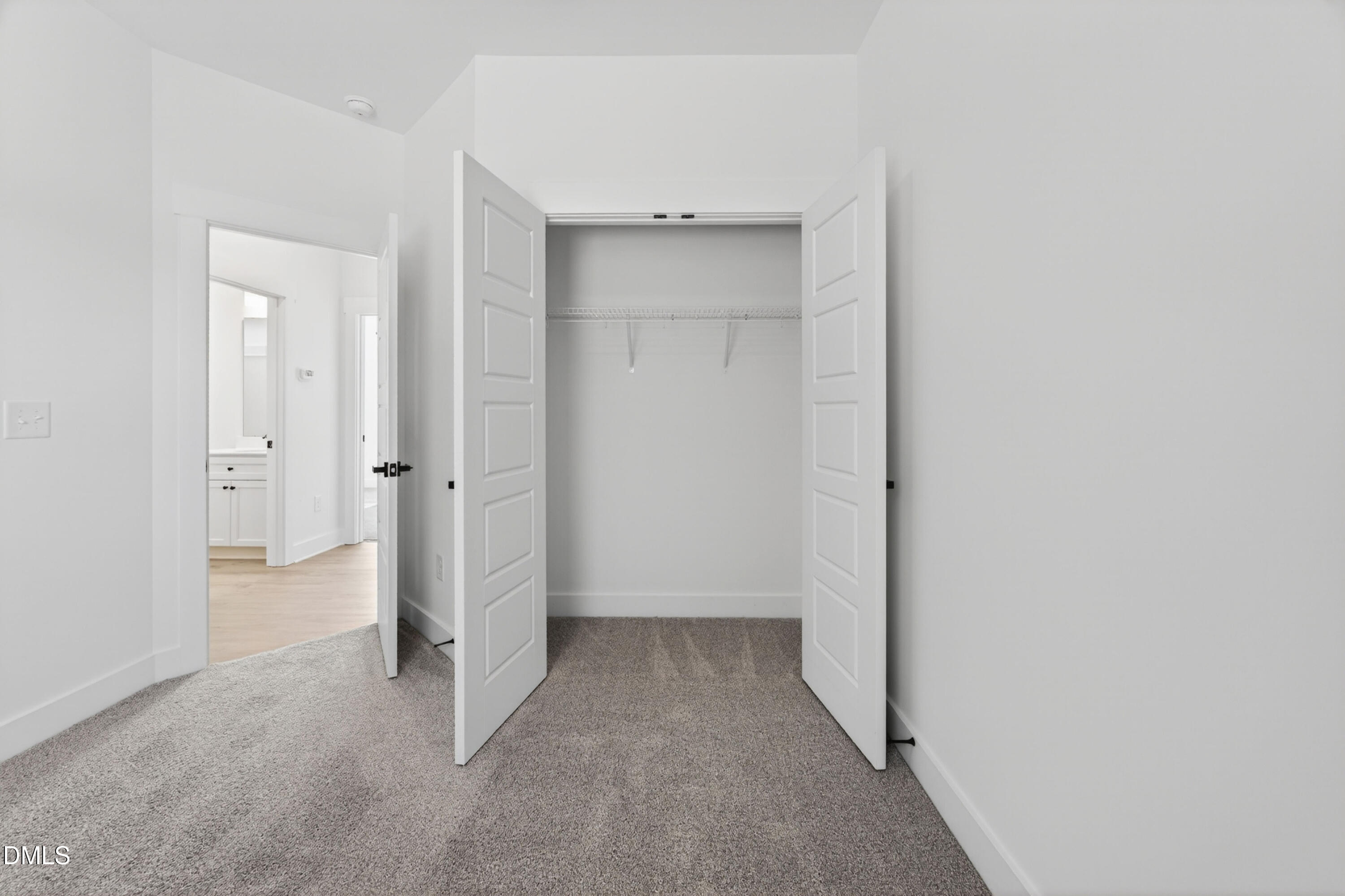 1196 Hurdle Mills Road Roxboro, NC 27573 - Photo 28 of 50 wooden floor and closet in a room