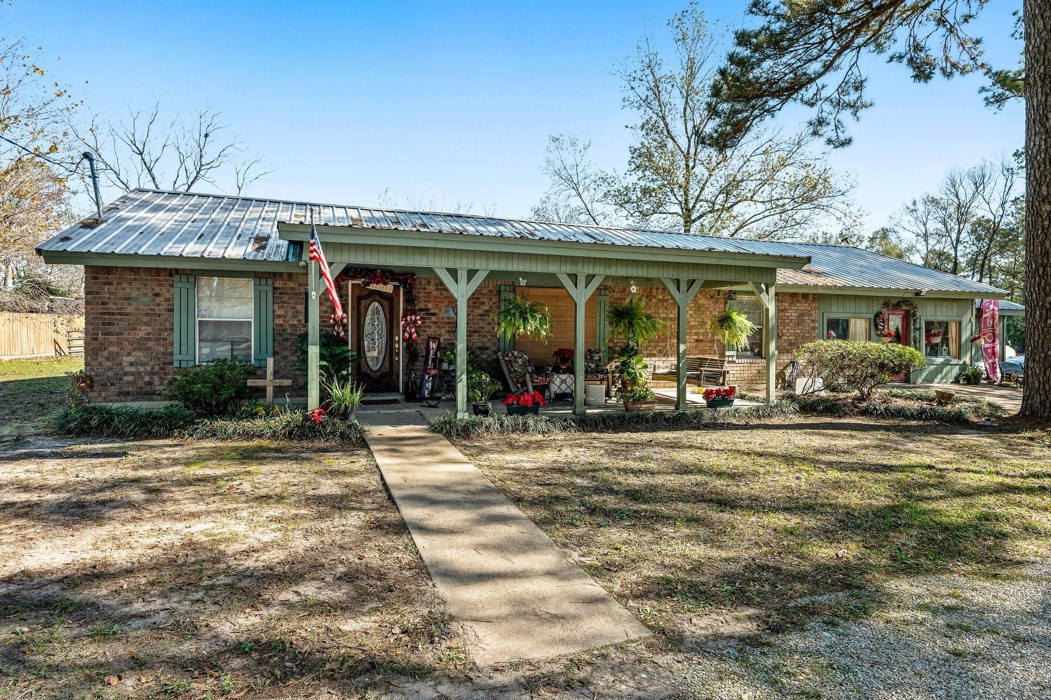 15091 Farm To Market 1485 Conroe, TX 77306 - Photo 1 of 28 a view of a house with a entertaining space
