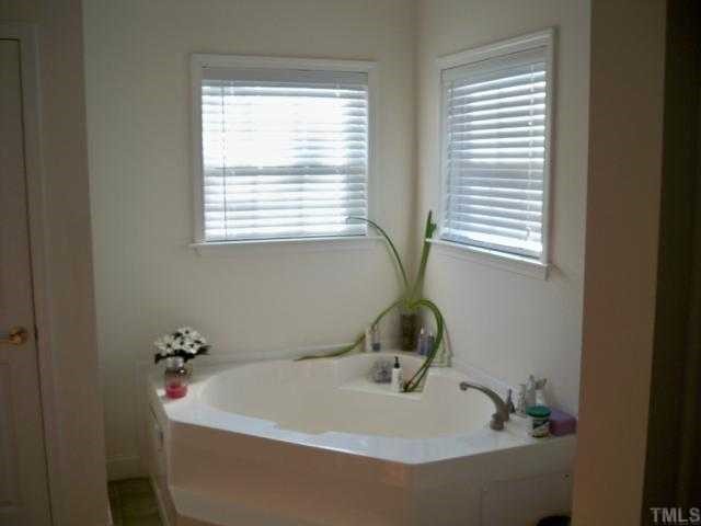 208 W Road Angier, NC 27501 - Photo 4 of 6 a bathroom with a sink