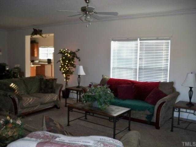 208 W Road Angier, NC 27501 - Photo 5 of 6 a living room with furniture and a window