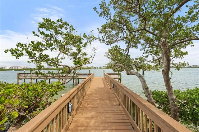 a wooden floor and lake view