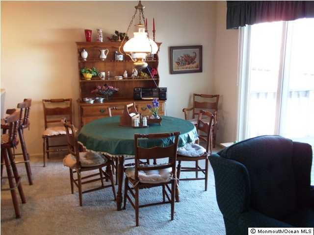 185 Peter Road Manahawkin, NJ 08050 - Photo 2 of 3 a dining room with furniture and window