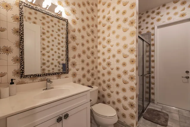 a bathroom with a sink and a toilet