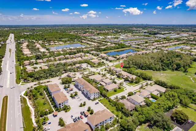 a view of a city with an ocean view