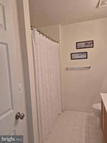 a kitchen with stainless steel appliances granite countertop a stove top oven a sink a counter top space and cabinets