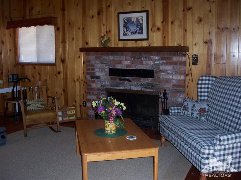 55290 Circle Way Idyllwild, CA 92549 - Photo 3 of 11 a living room with furniture and a fireplace