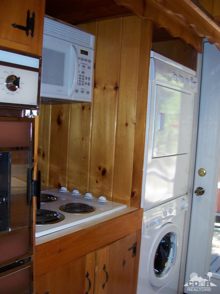 55290 Circle Way Idyllwild, CA 92549 - Photo 7 of 11 a bathroom with a sink a washer and dryer