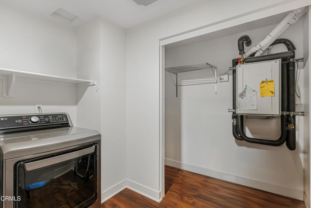 2820 Wagon Wheel Road, Unit 302 Oxnard, CA 93036 - Photo 18 of 26 a utility room with dryer and washer