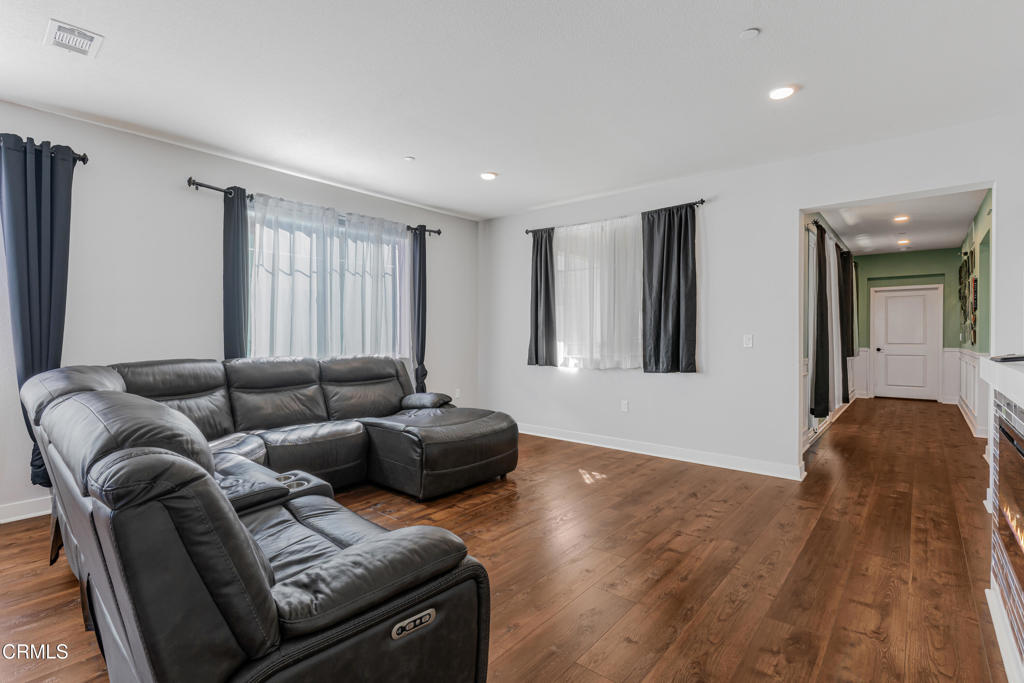 2820 Wagon Wheel Road, Unit 302 Oxnard, CA 93036 - Photo 2 of 26 a living room with furniture and a window