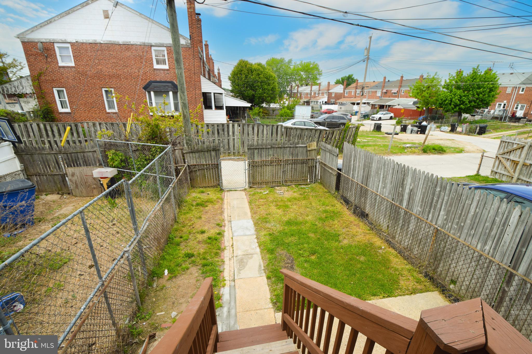 1922 Armco Way Dundalk, MD 21222 - Photo 11 of 26 a view of a chairs and table in the balcony