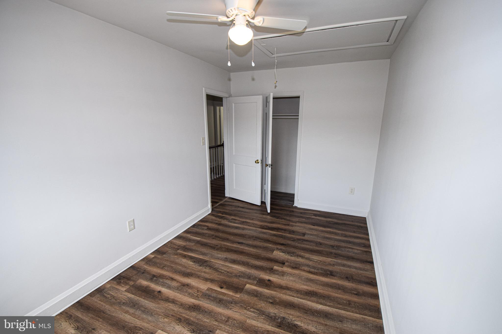 1922 Armco Way Dundalk, MD 21222 - Photo 17 of 26 wooden floor in an empty room