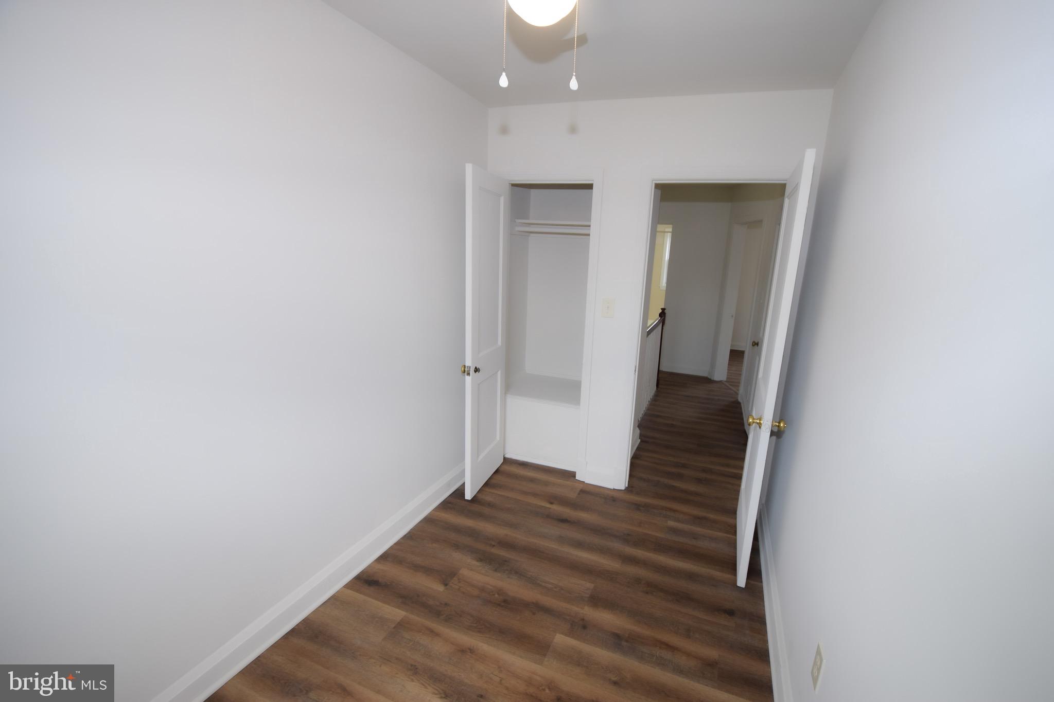 1922 Armco Way Dundalk, MD 21222 - Photo 19 of 26 a view of a hallway with wooden floor and entryway