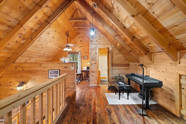 a view of a balcony with chairs