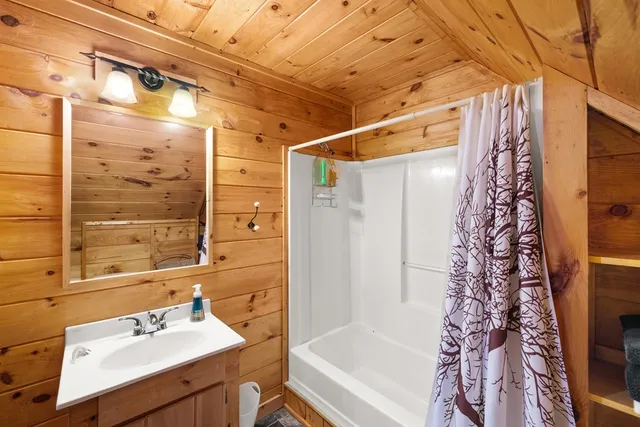 a bathroom with a sink and a bathtub