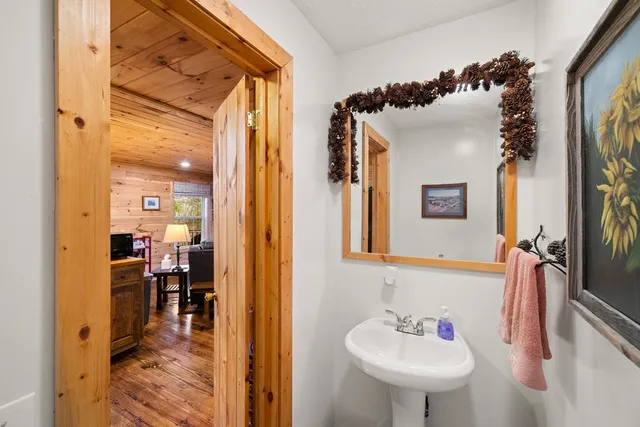 a en suite bathroom with a sink and mirror