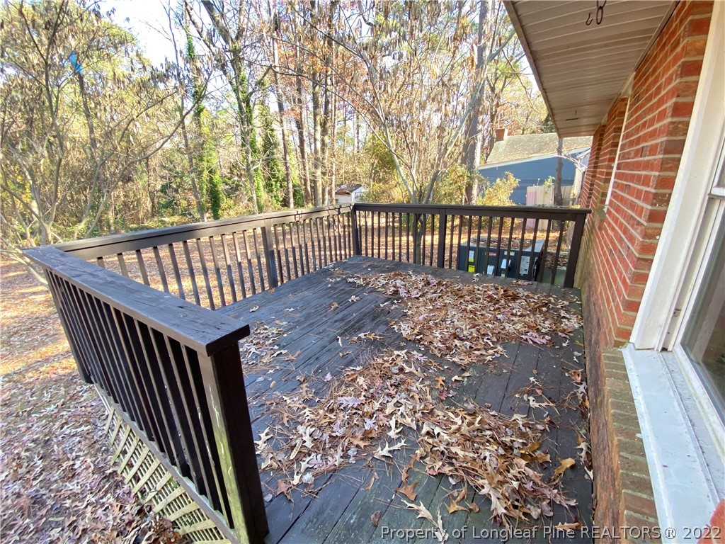 3518 Drayton Road Fayetteville, NC 28303 - Photo 15 of 17 a view of balcony with wooden floor
