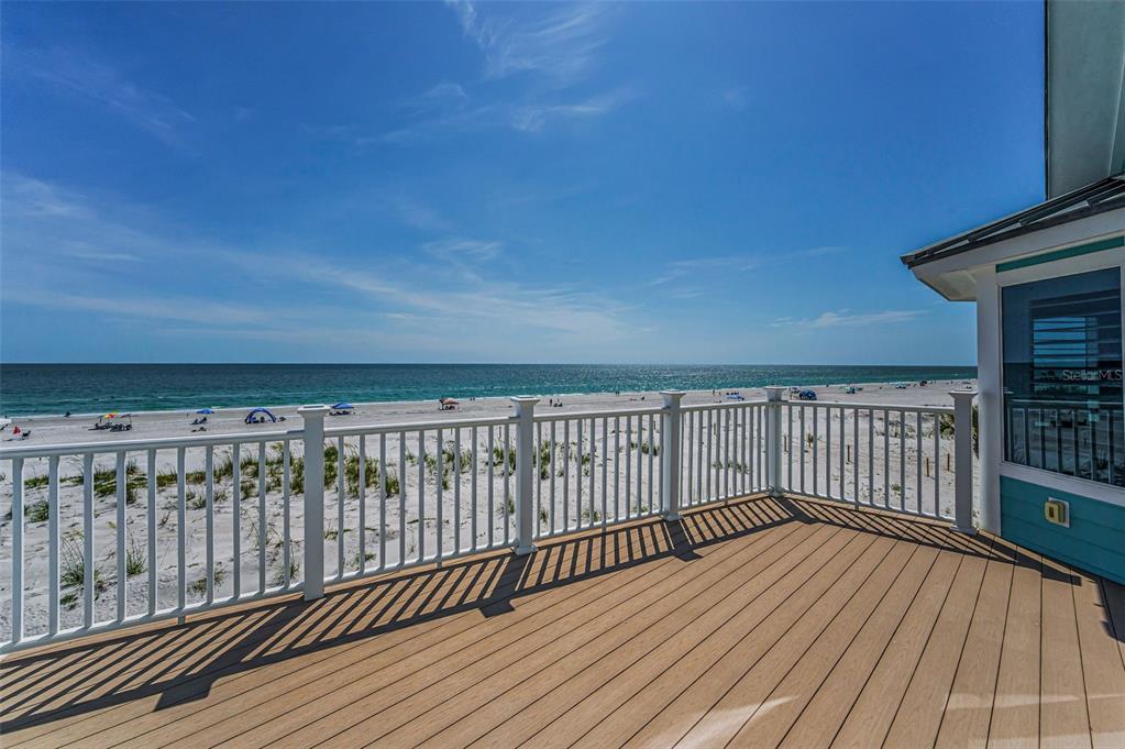 13303 Gulf Lane Madeira Beach, FL 33708 - Photo 4 of 42 a view of wooden balcony with wooden floor