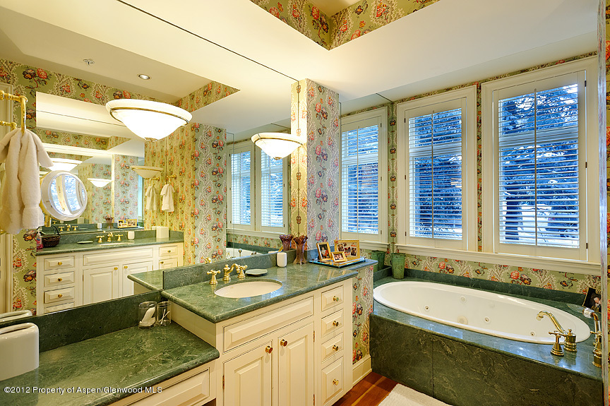 102 North Spring Street, Unit #2 Aspen, CO 81611 - Photo 13 of 18 a bathroom with a tub a sink and a large window