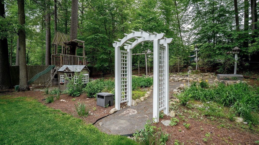 142 Baker Street Walpole, MA 02081 - Photo 41 of 42 a view of a chair and table in the garden