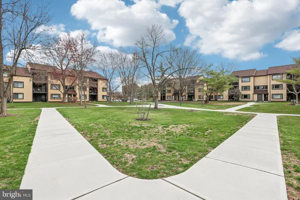 a view of a hallway with a white walls