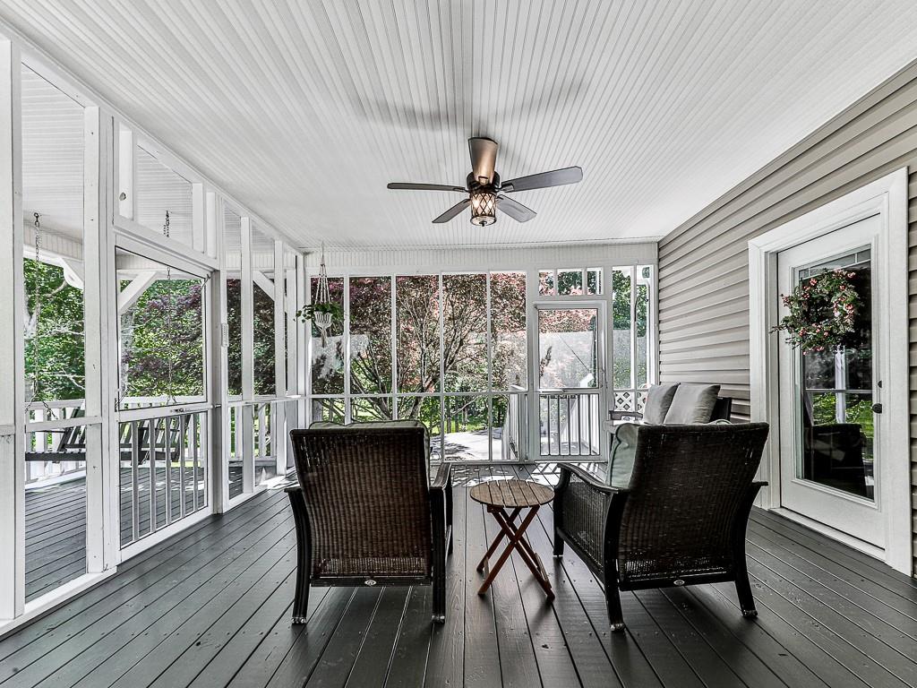 397 Thomas Road Dallas, GA 30132 - Photo 77 of 108 a dining room with furniture window and wooden floor
