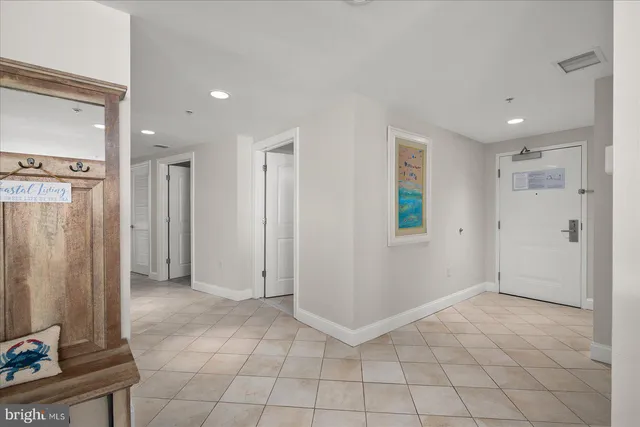 a view of a chairs and table in a balcony
