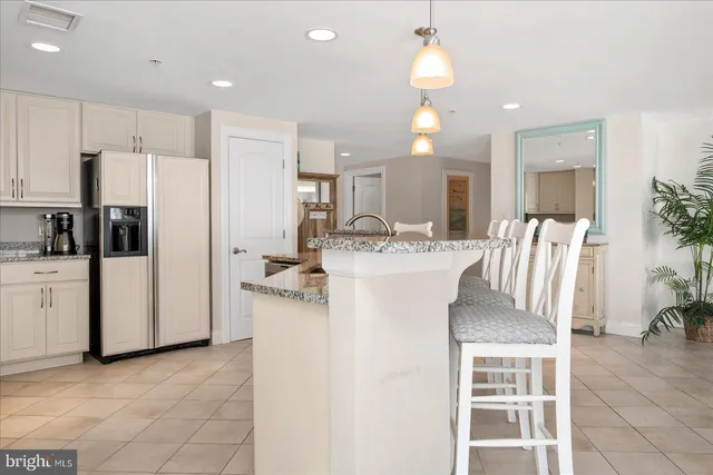 a bedroom with a bed and flat screen tv