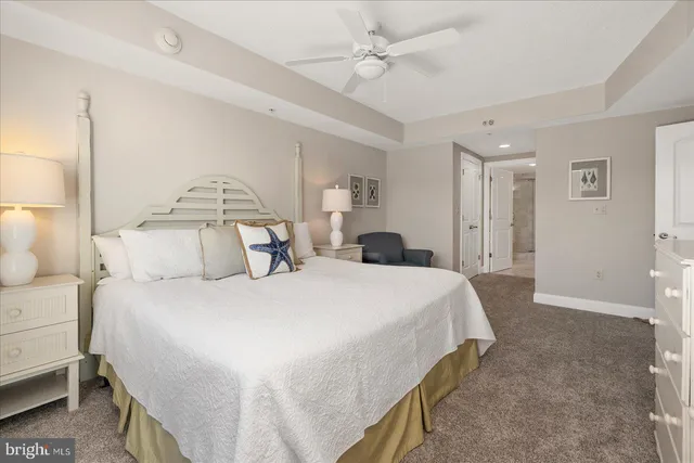 a living room with gym equipment and a large window