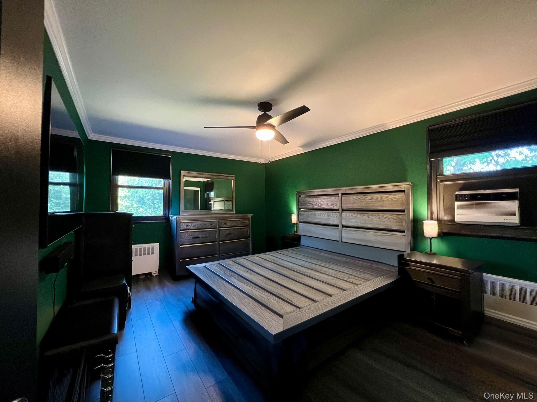17-72 166th Street, Unit 2 Queens, NY 11357 - Photo 7 of 13 a view of a livingroom with furniture and a kitchen