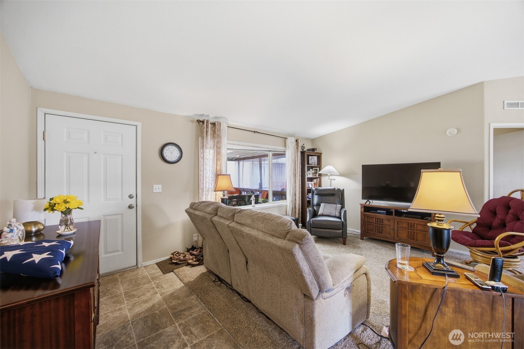 380 East Pole Road, Unit 6 Lynden, WA 98264 - Photo 6 of 40 a living room with furniture and a flat screen tv