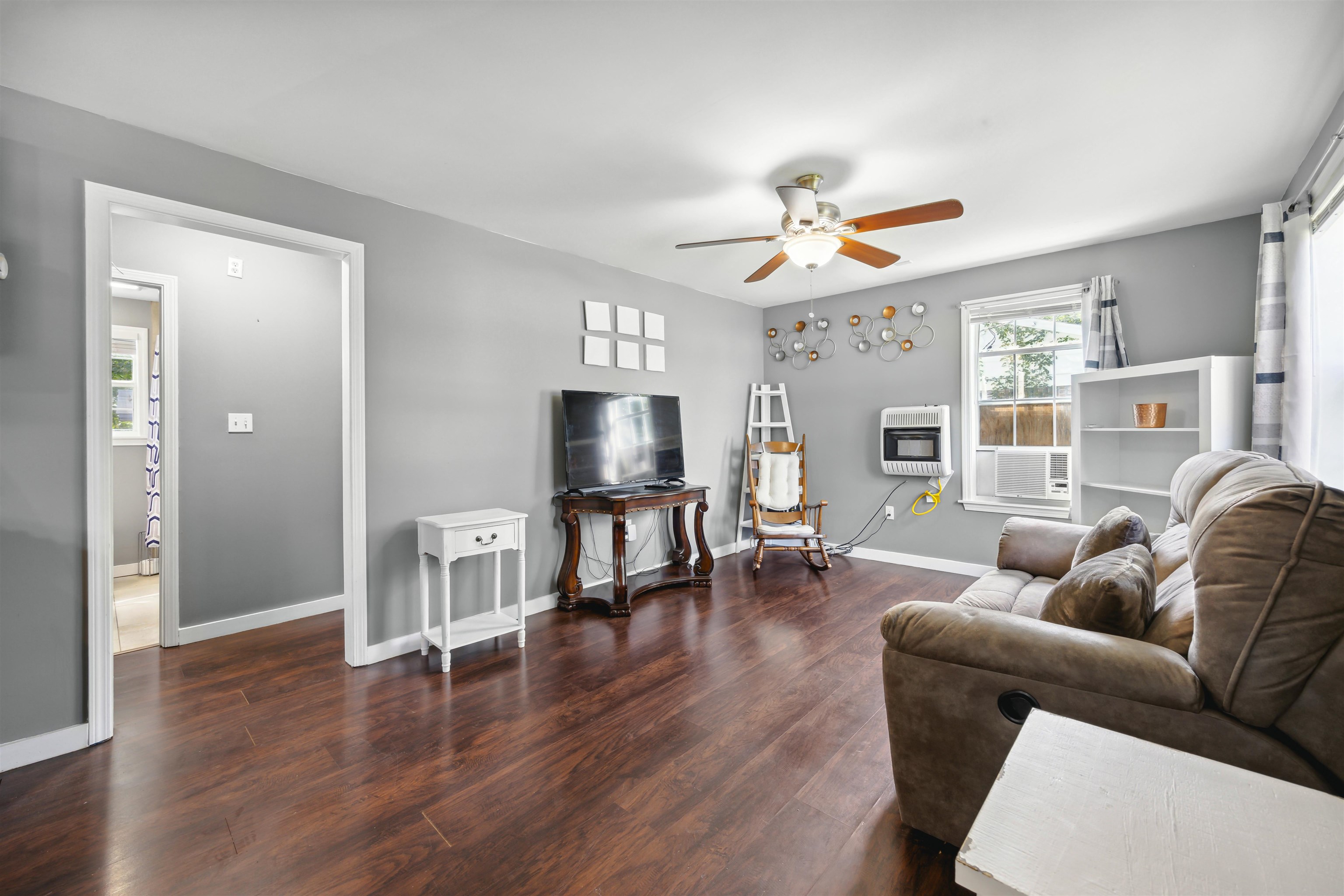 3014 Benjestown Road Memphis, TN 38127 - Photo 7 of 15 Living room featuring ceiling fan and dark hardwood / wood-style floors