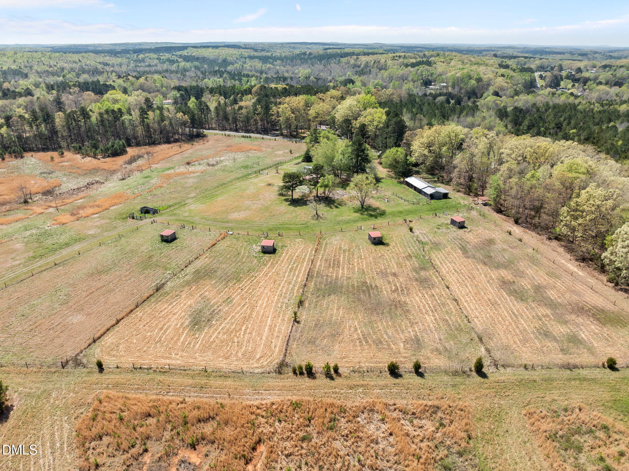 212 Thomas Humphries Road Roxboro, NC 27574 - Photo 12 of 56 a view of a dry yard with wooden fence