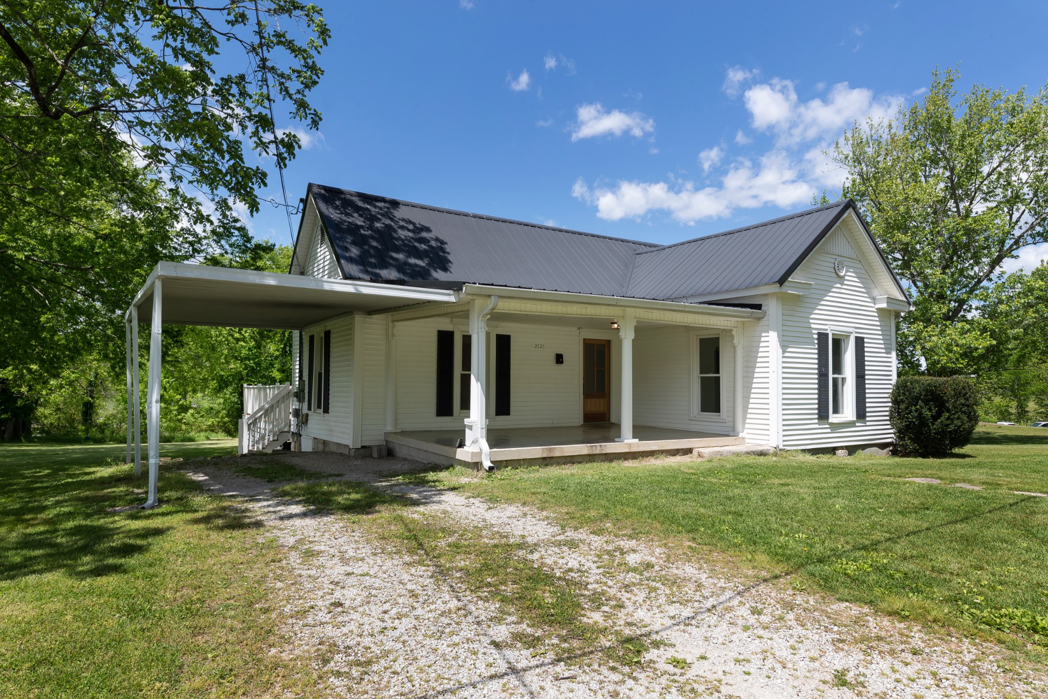 2727 Fly Road Santa Fe, TN 38482 - Photo 19 of 21 a front view of a house with a yard