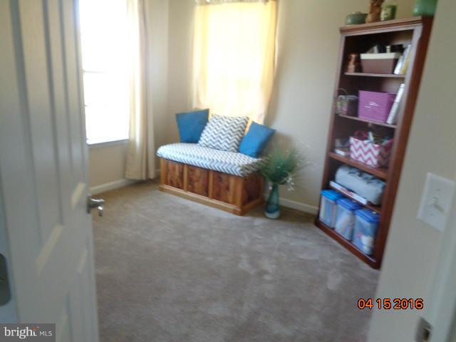 359 Boise Road Inwood, WV 25428 - Photo 14 of 22 a living room with furniture and a window