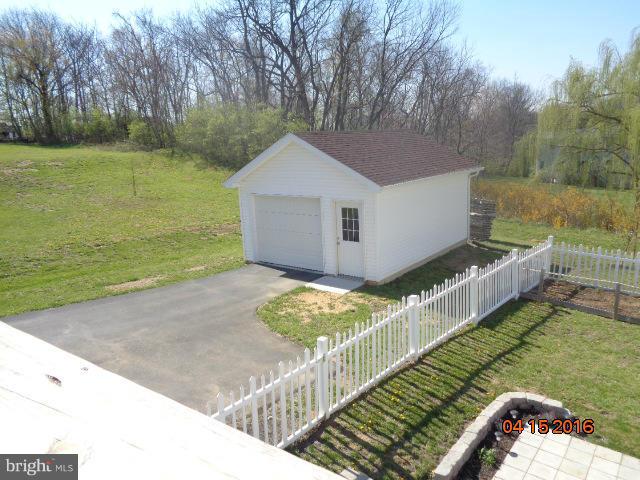 359 Boise Road Inwood, WV 25428 - Photo 22 of 22 a view of a house with backyard and trees
