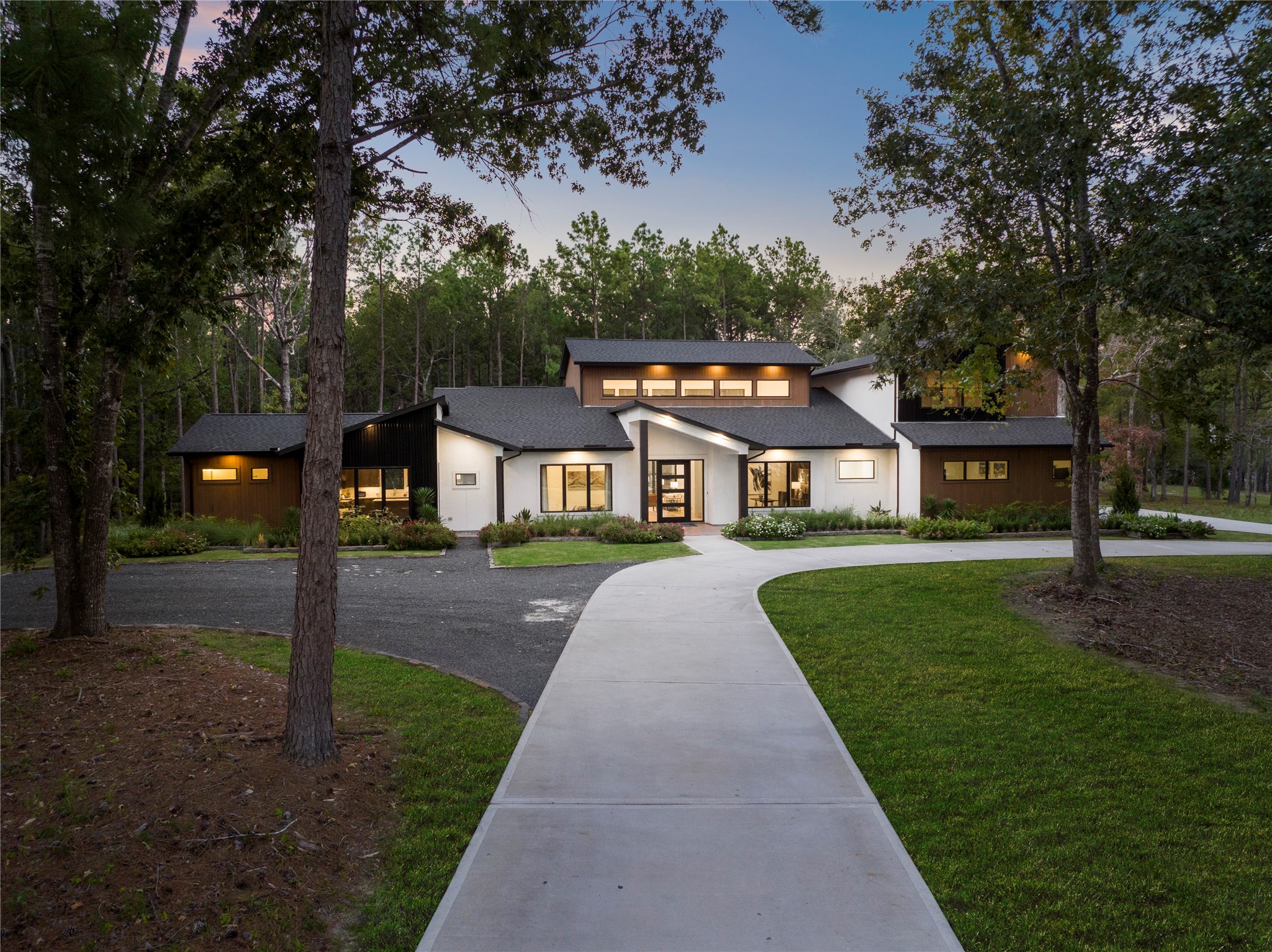 15702 Ridge Rock Road Willis, TX 77378 - Photo 17 of 19 a front view of a house with a yard and trees