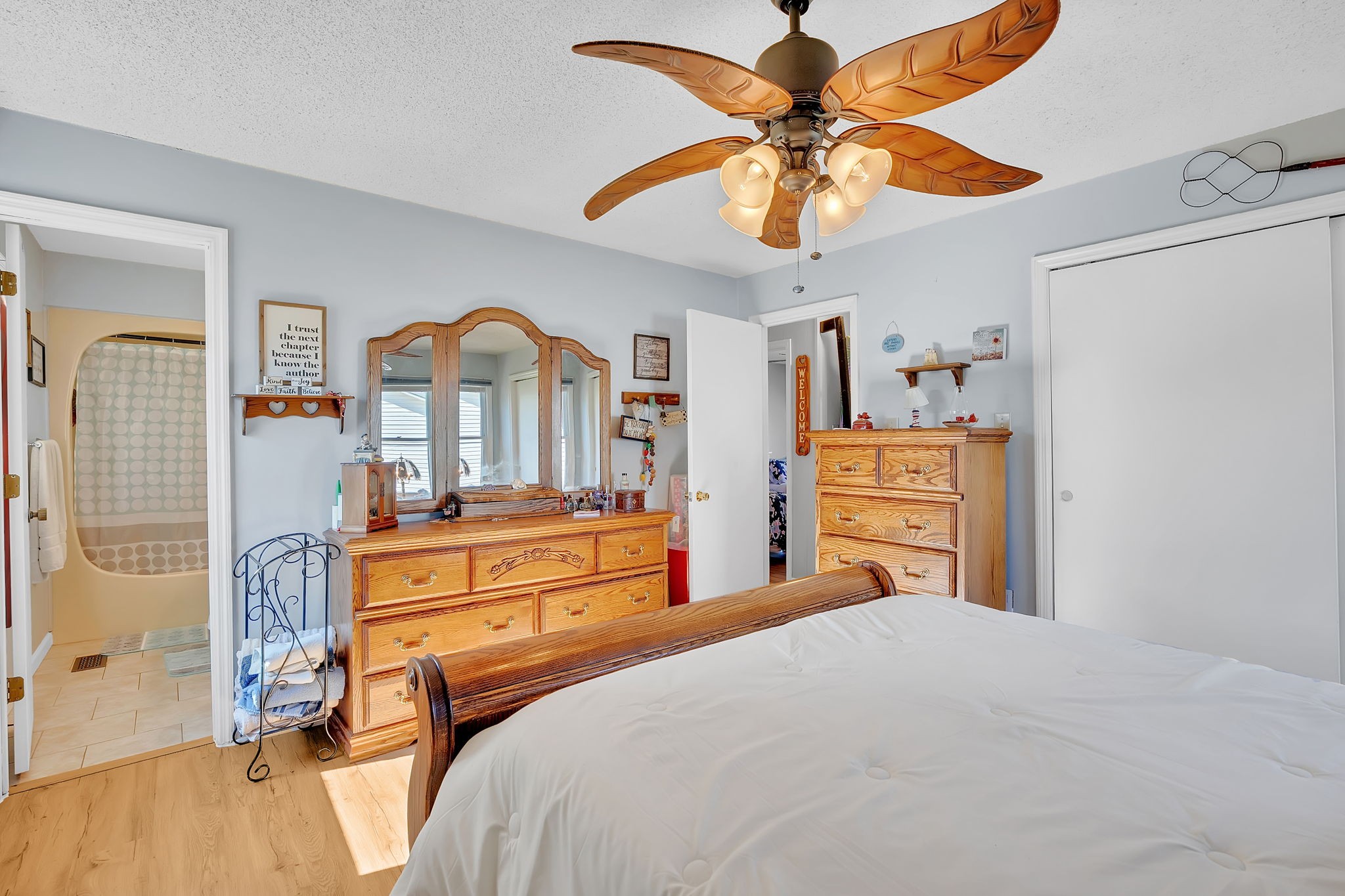 103 Lisa Circle Winchester, TN 37398 - Photo 19 of 61 a bedroom with a bed and a chandelier