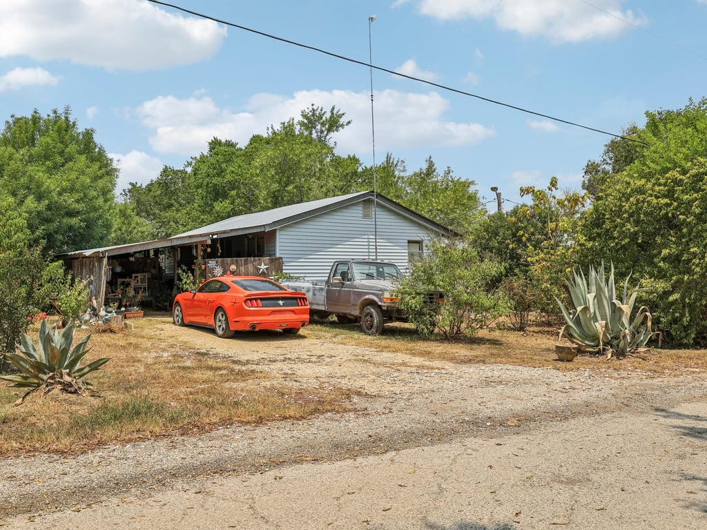 Tbd Tbd Bluebonnet Road Lockhart, TX 78644 - Photo 15 of 20 a view of a car in front of house