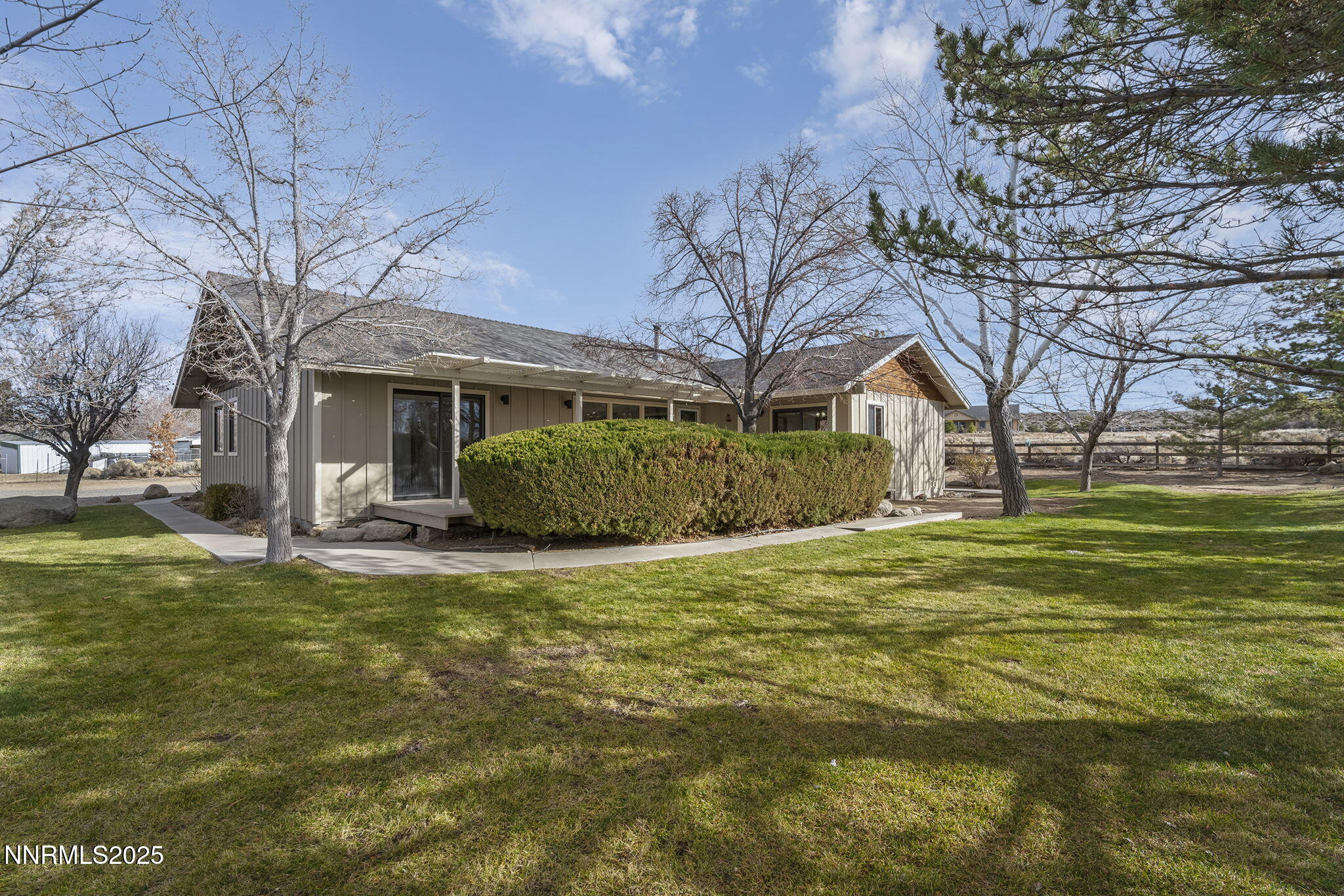 1653 Dees Lane Minden, NV 89423 - Photo 26 of 36 a view of a house with a yard