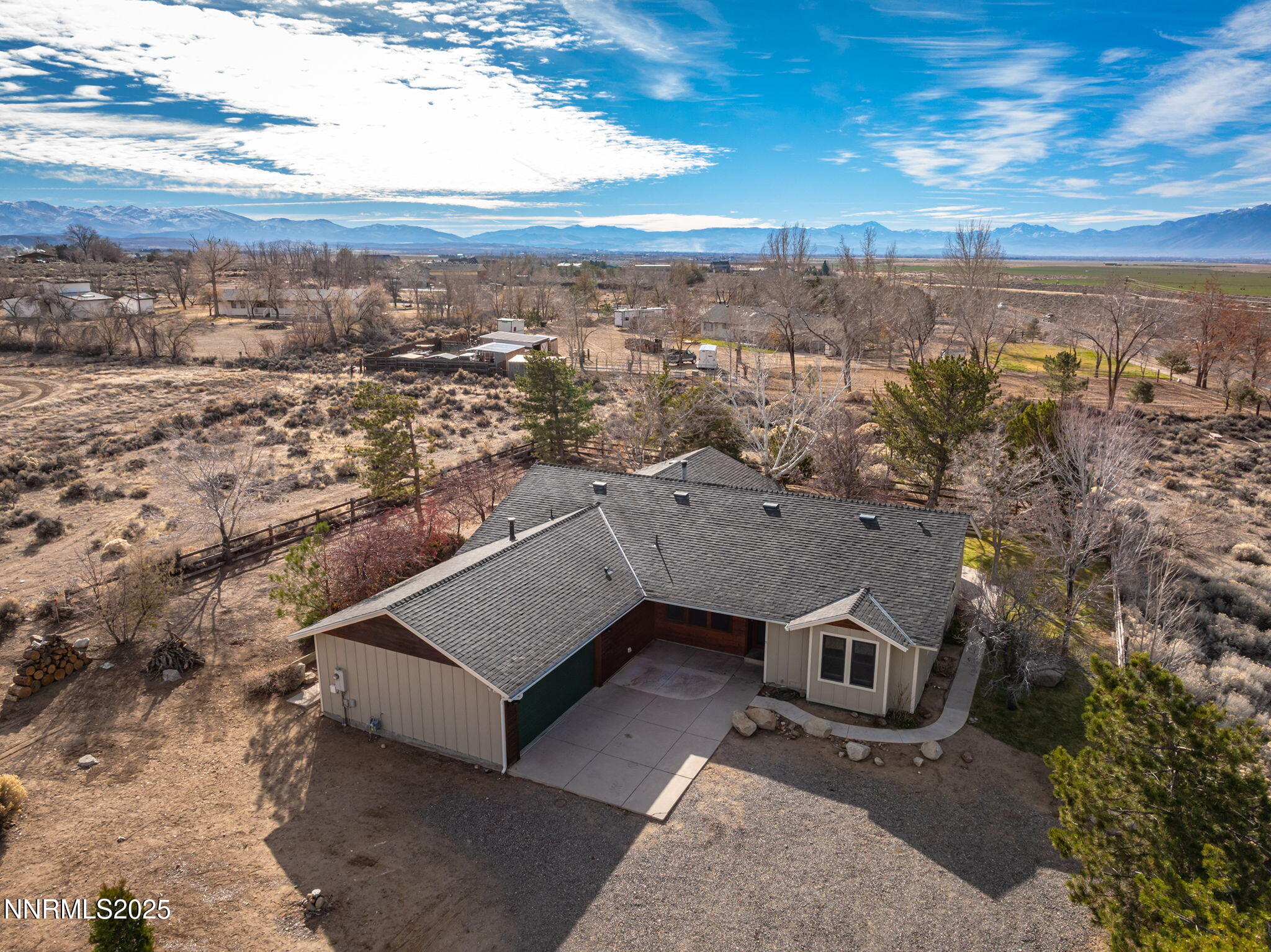 1653 Dees Lane Minden, NV 89423 - Photo 30 of 36 an aerial view of a house with a yard