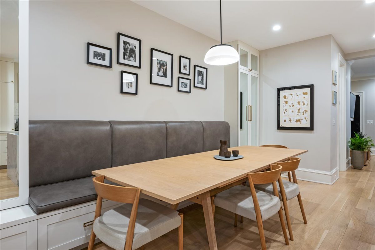 2212 North Halsted Street, Unit 1 Chicago, IL 60614 - Photo 13 of 38 a view of a dining room with furniture and wooden floor