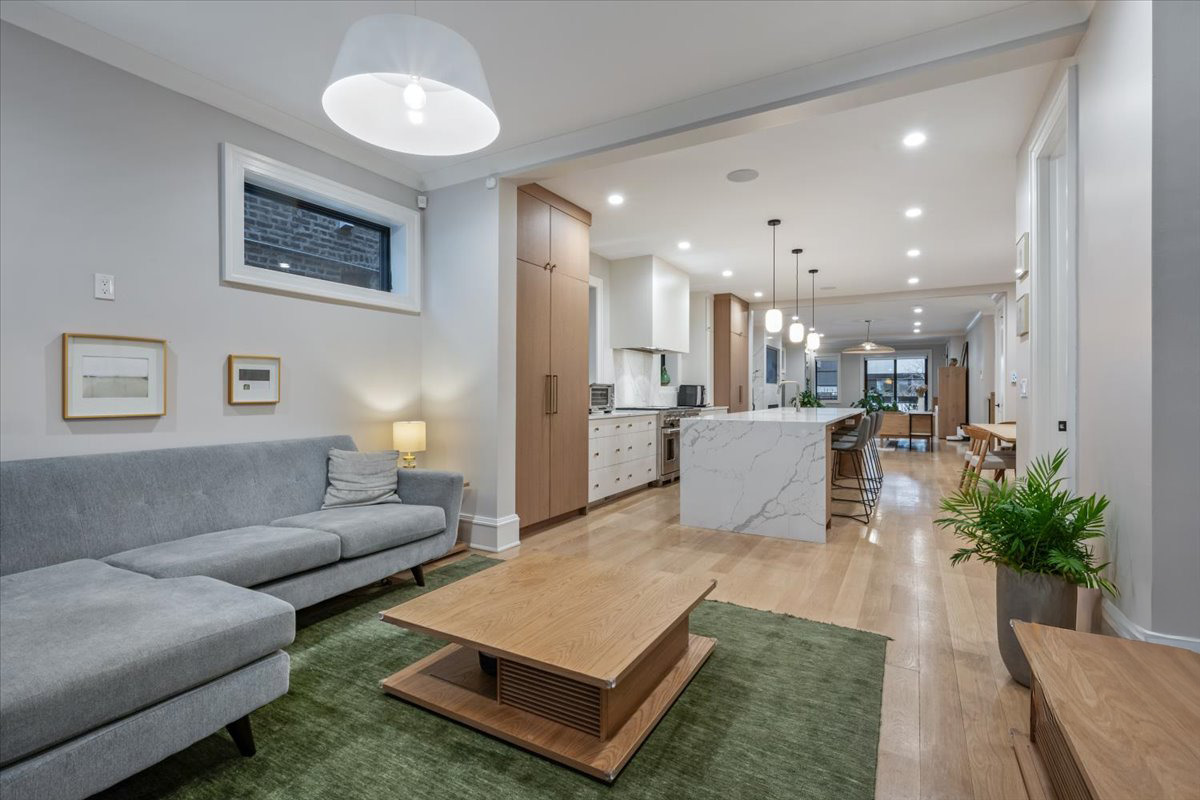 2212 North Halsted Street, Unit 1 Chicago, IL 60614 - Photo 16 of 38 a living room with furniture and a potted plant