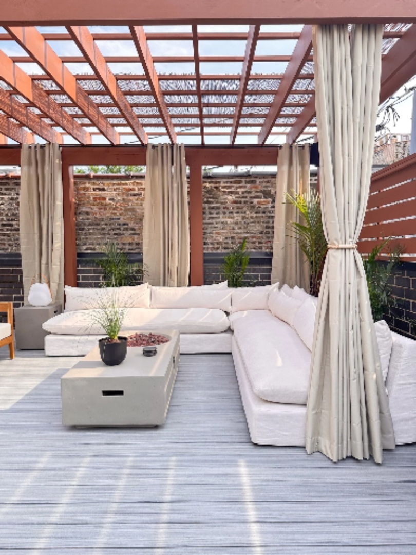 2212 North Halsted Street, Unit 1 Chicago, IL 60614 - Photo 36 of 38 a living room with furniture and a large window