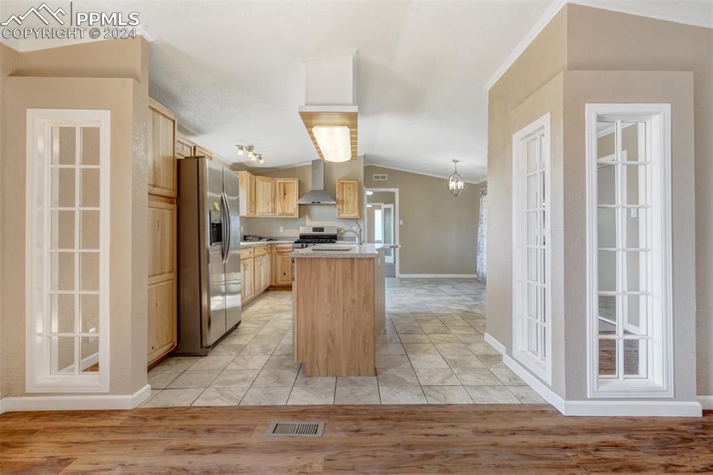 6240 Night Train Lane Yoder, CO 80864 - Photo 14 of 50 a view of kitchen dining space with wooden floor