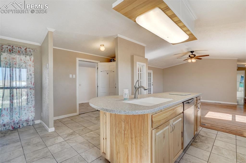 6240 Night Train Lane Yoder, CO 80864 - Photo 19 of 50 a bathroom with a sink a vanity and a mirror