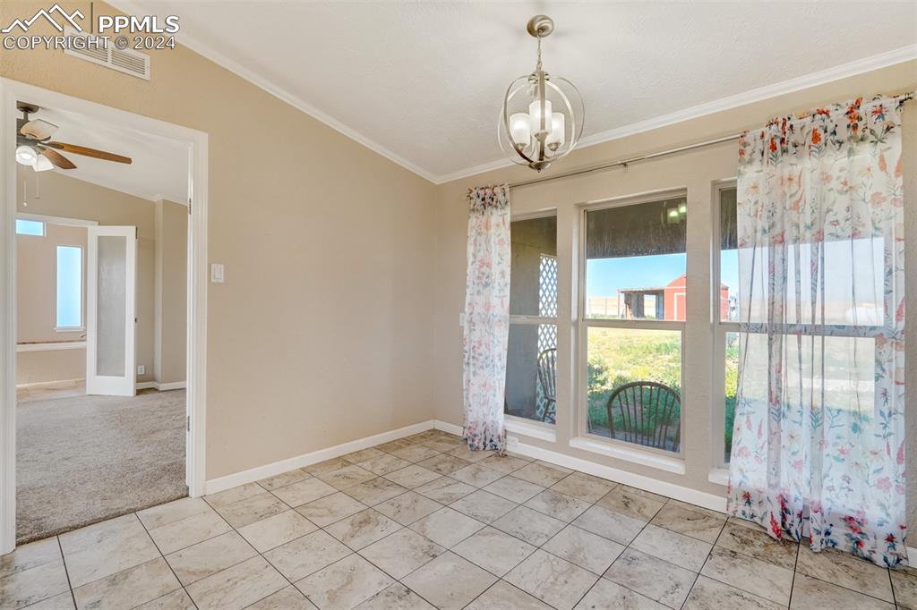 6240 Night Train Lane Yoder, CO 80864 - Photo 21 of 50 a view of an empty room and window