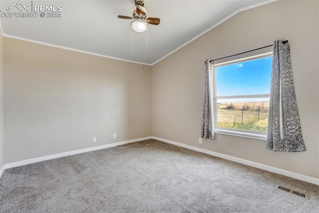 6240 Night Train Lane Yoder, CO 80864 - Photo 34 of 50 an empty room with a window