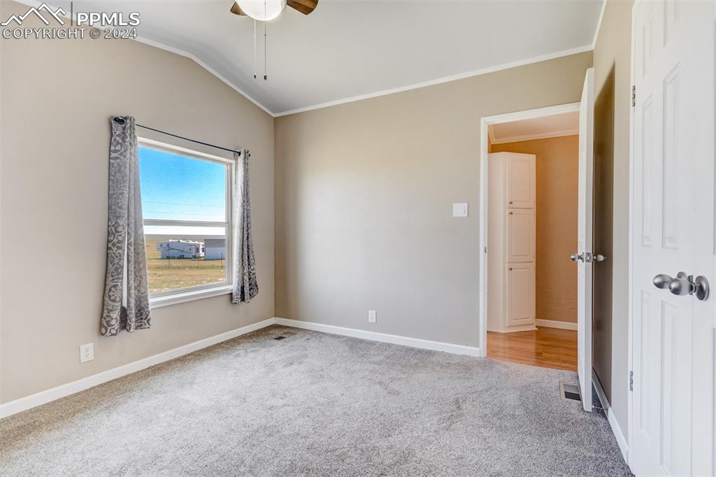 6240 Night Train Lane Yoder, CO 80864 - Photo 35 of 50 a view of an empty room with a window